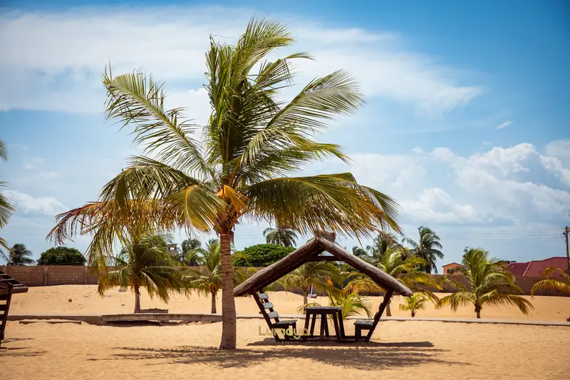 Shade waiting on an empty beach